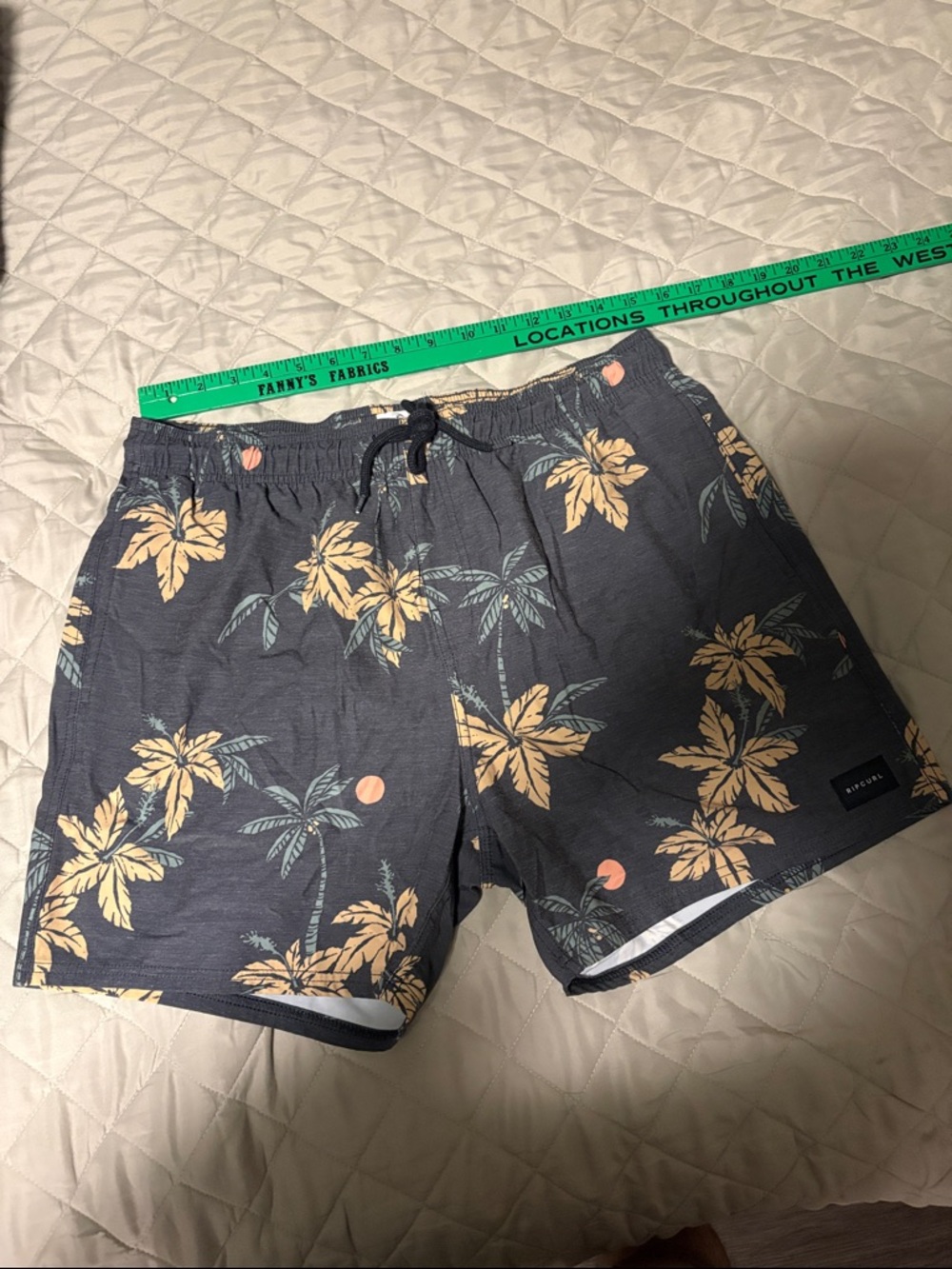 Rip Curl Black Swim Shorts with Peach Floral Print